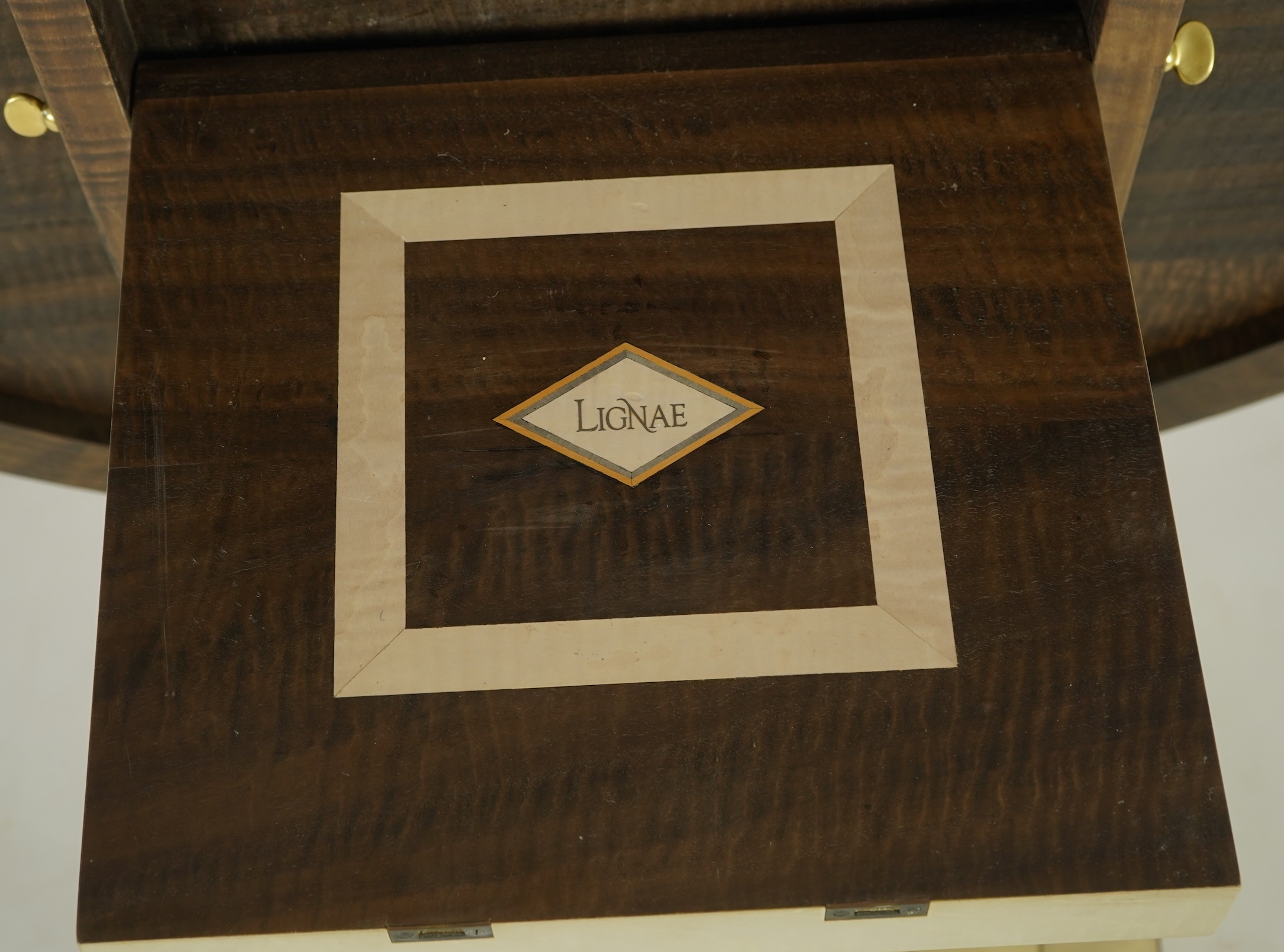 Lignae: A contemporary chrysanthemum and specimen wood inlaid circular tilt top centre table